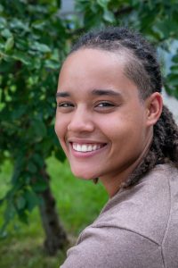 Headshot of Jaylin in front of a tree